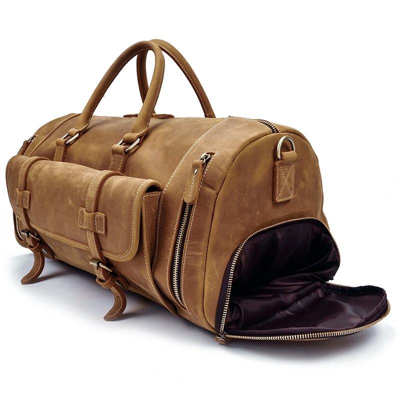 Leather weekender travel Duffle bag showing separate Shoe Compartment on a white background