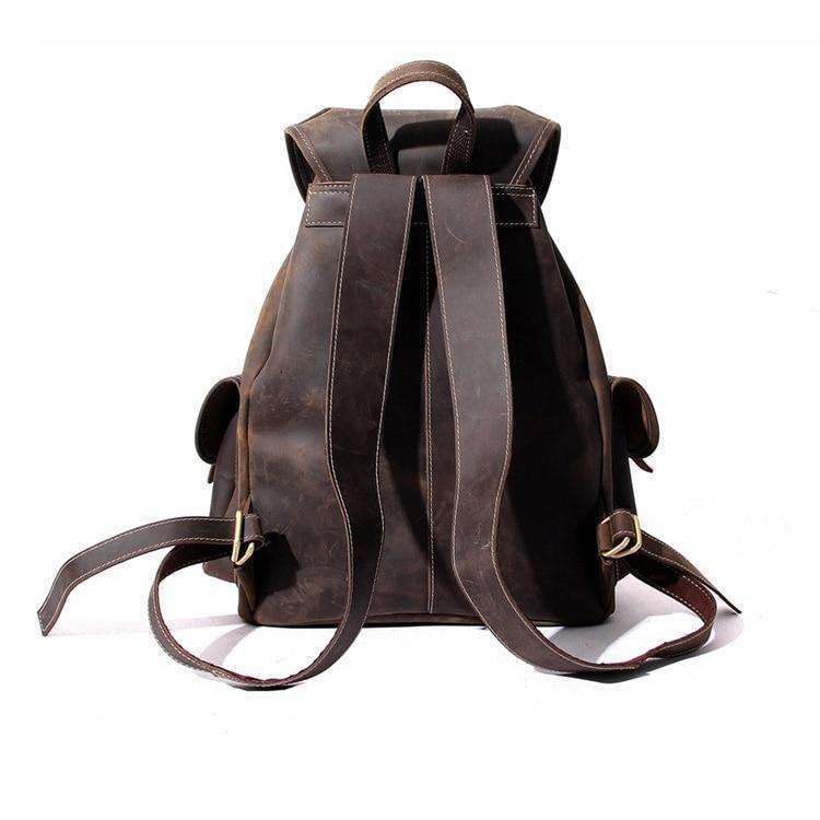 Acadia Dark Brown Leather Backpack back view showing leather straps for your shoulders on a plain white background