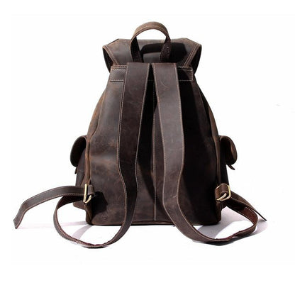 Acadia Dark Brown Leather Backpack back view showing leather straps for your shoulders on a plain white background