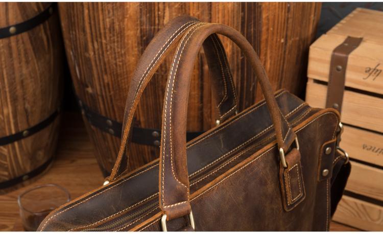 top view of Bryce leather dark brown briefcase showing close up of leather handle