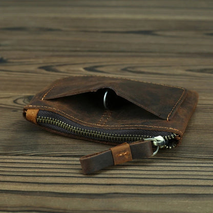 Canaveral coin purse on table open showing loose change