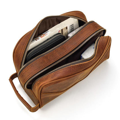 Dual zippered open pockets of Saratoga men's toiletry bag and dopp kit